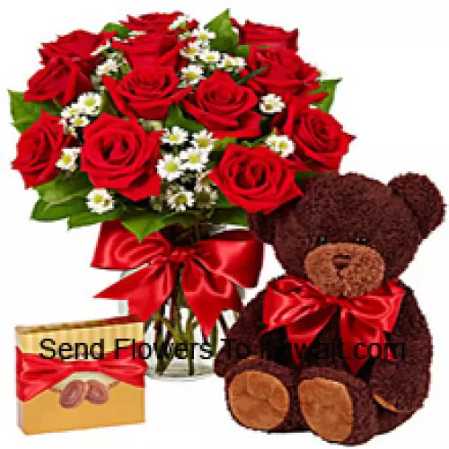 12 Red Roses With Some Ferns In A Glass Vase, A Cute 14 Inches Tall Teddy Bear And An Imported Box Of Chocolates
