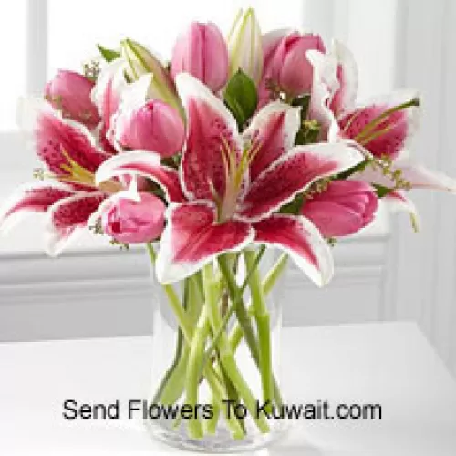 Pink Lilies And Pink Tulips In A Glass Vase