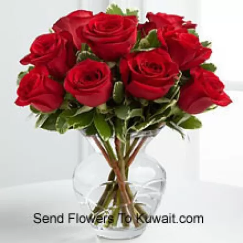 10 Red Roses With Some Ferns In A Vase
